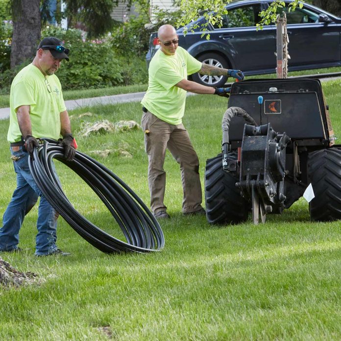 pull pipes install irrigation system vibratory plow