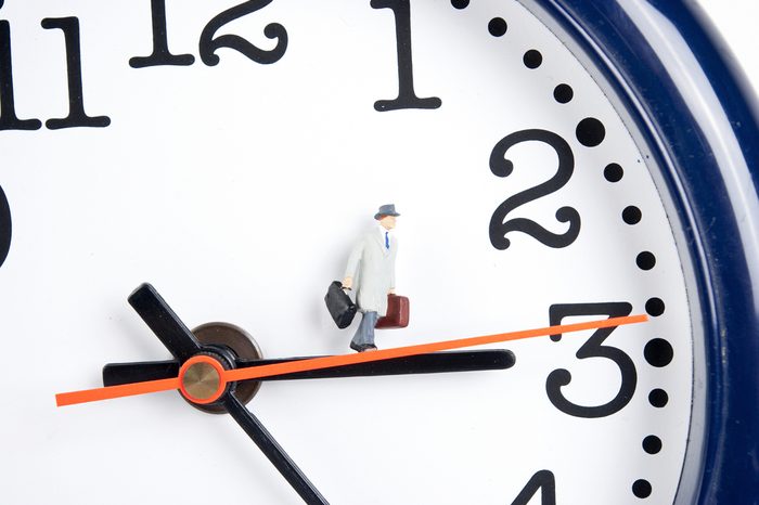traveler on clock in time