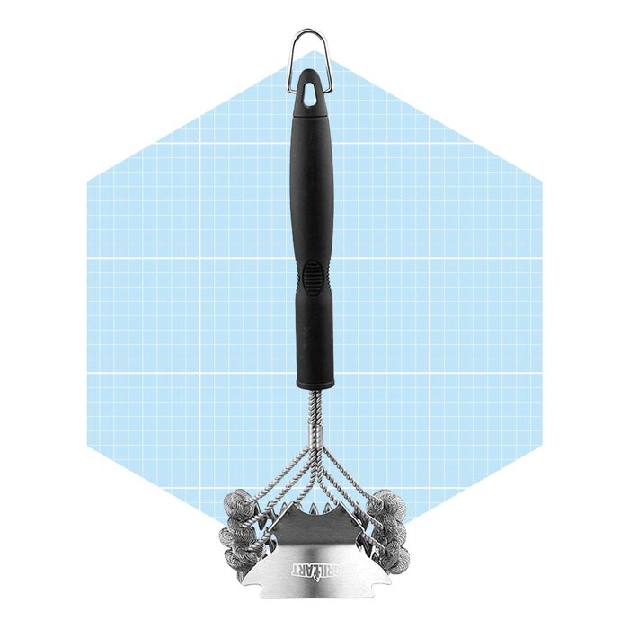 A kitchen tool with a black handle and stainless steel head is positioned in front of a light blue grid background, designed for food preparation.