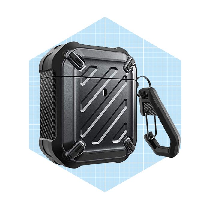 A black protective case with a keychain attachment holds earbuds, featuring a textured surface and angular design against a light blue grid background.
