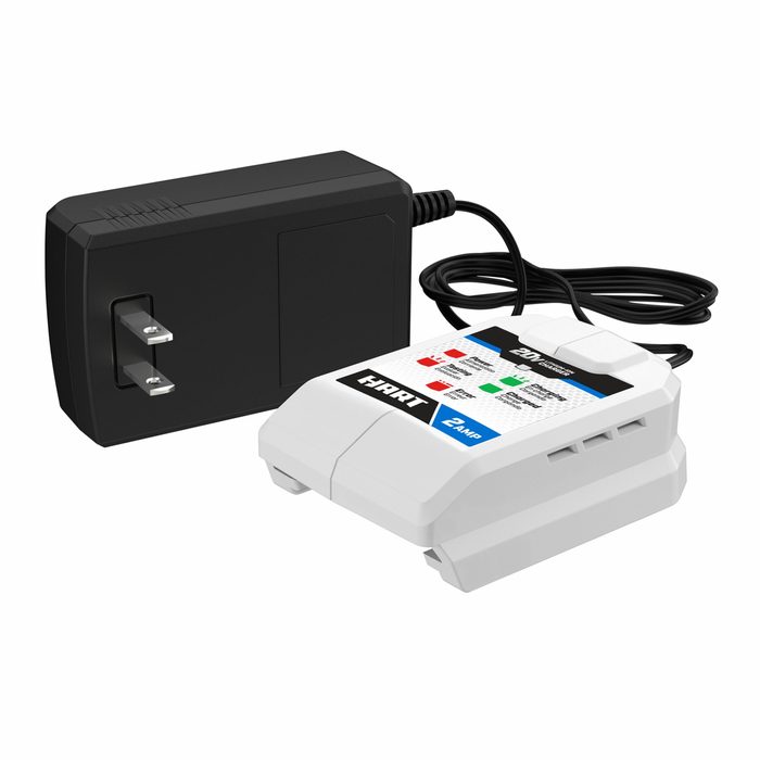 A black power adapter is connected to a white battery charger. The charger displays various lights indicating status, set against a plain background.