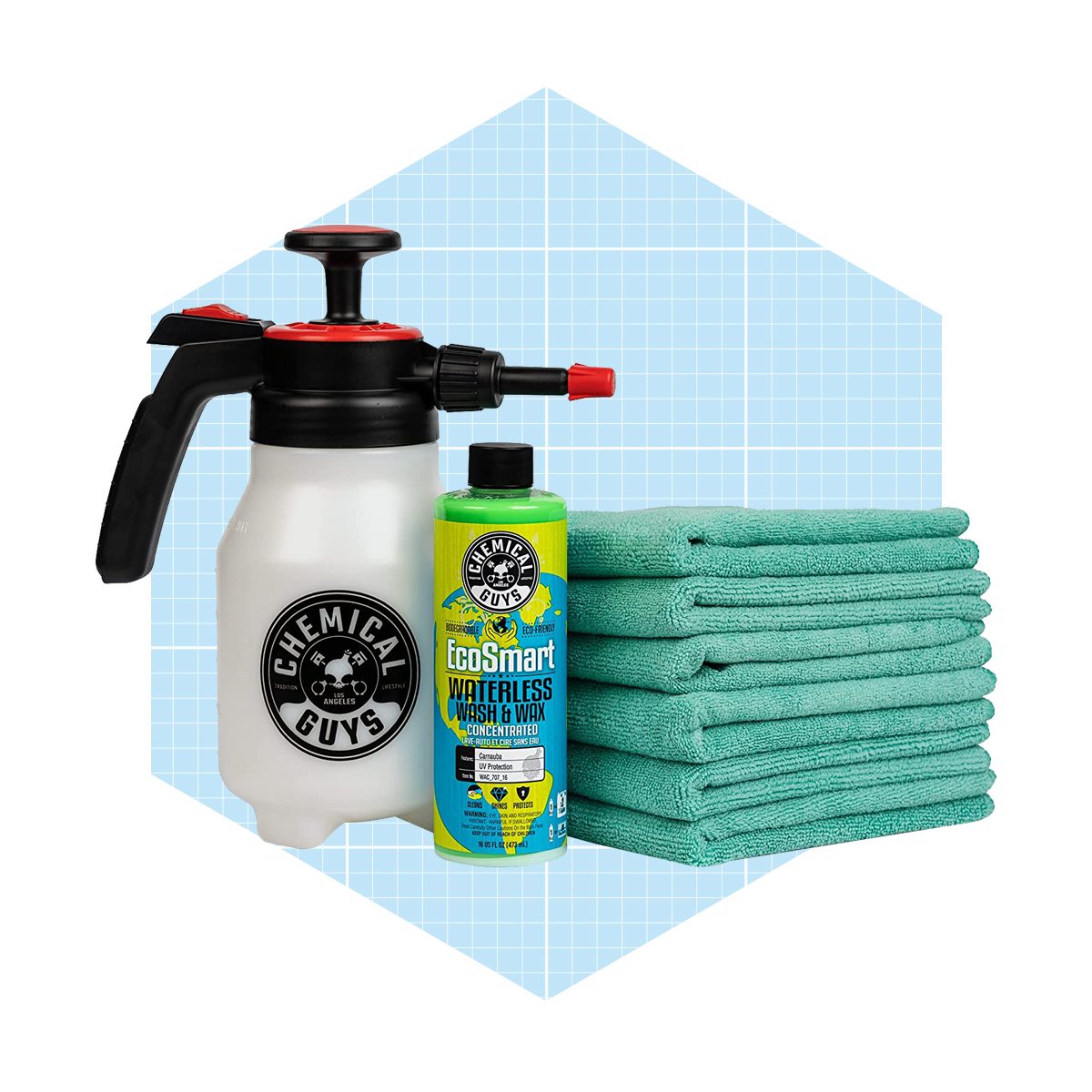 A spray bottle, cleaning solution, and stacked microfiber towels are arranged against a light blue grid background, suggesting tools for a waterless car wash.