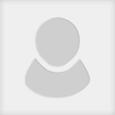 A circular, gray placeholder image represents an unidentified person. It appears on a plain background, indicating no specific features or context.