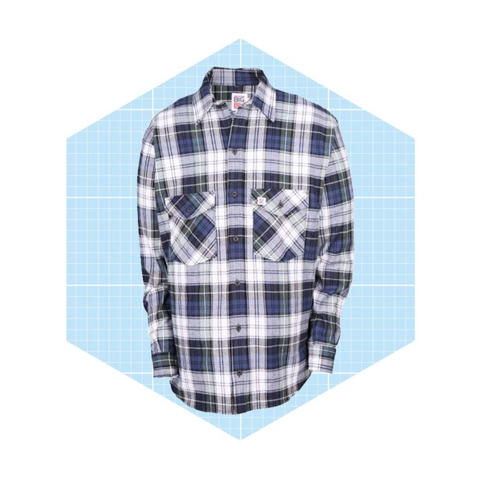 A blue and white plaid shirt is displayed, featuring two chest pockets, against a light blue grid background.