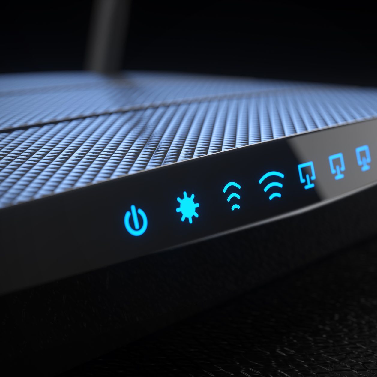 A router showcases glowing blue indicator lights, revealing operational status. The textured surface reflects light against a dark, smooth background.
