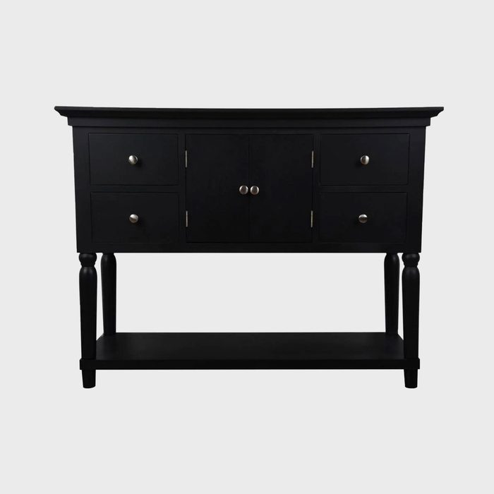 A black wooden console table features six drawers and a cabinet, positioned on four legs, with a bottom shelf for additional storage.