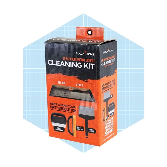 A boxed cleaning kit is displayed, showcasing cleaning tools with 