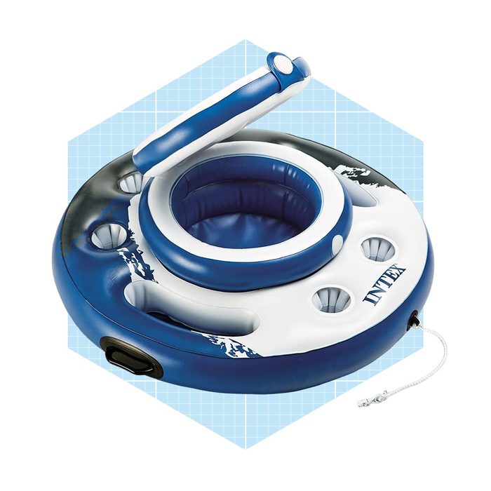 A blue and white inflatable lounge with a central seat and cup holders is positioned against a light blue geometric background, designed for water relaxation.