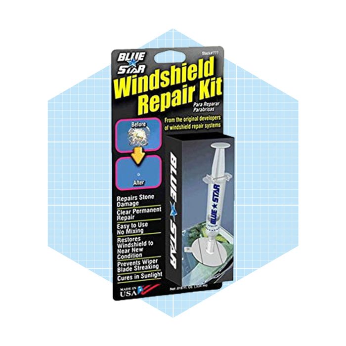 A windshield repair kit is displayed in packaging, promising to fix stone damage and restore the windshield's clarity, set against a light blue background.