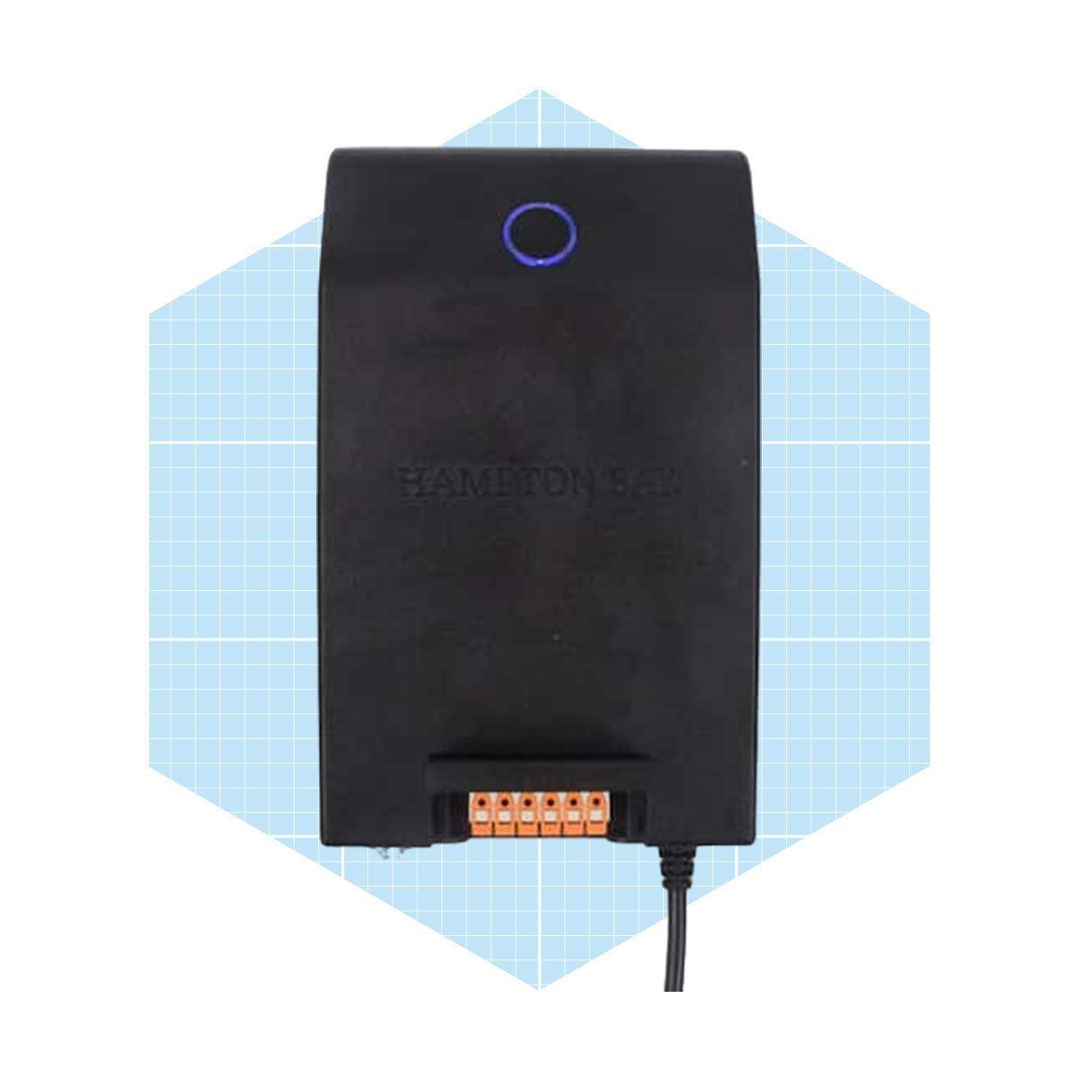 A black charging device sits on a light blue geometric background, featuring a blue power indicator and multiple connection ports at the bottom.