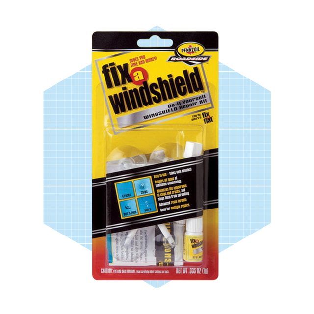 A windshield repair kit is displayed, containing various components for fixing cracks and chips. It's packaged attractively with instructional text and marketing highlights.
