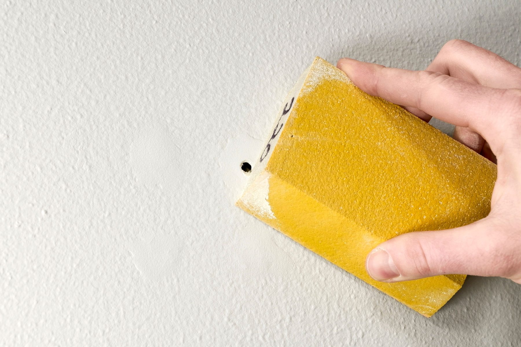 Sand Off Loose Peeling Drywall